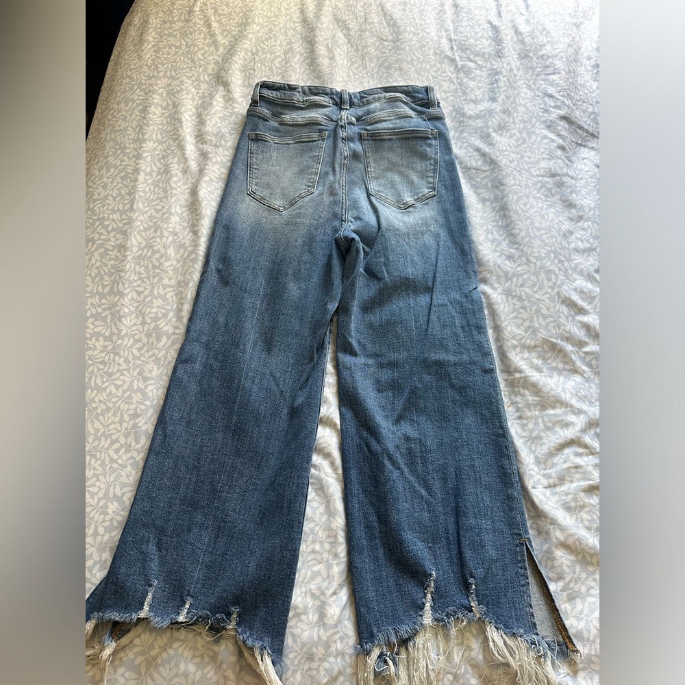 Risen jeans/ 11/30, medium wash with no holes, openings at bottom with slits